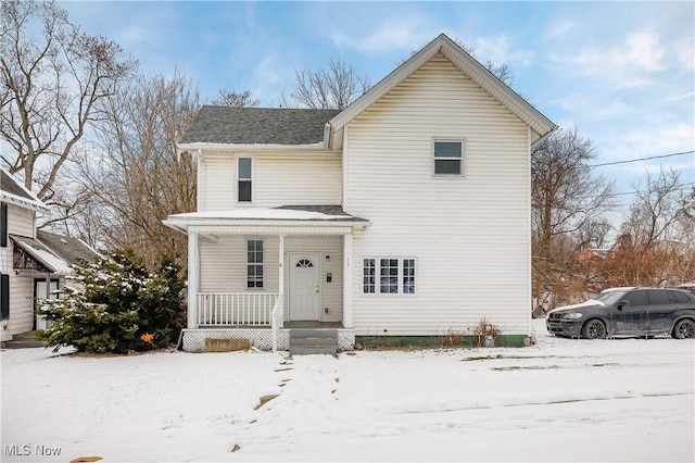 view of property featuring a porch