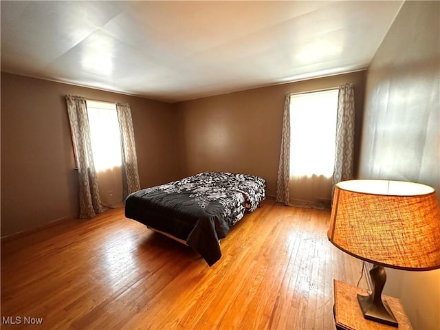 bedroom with light hardwood / wood-style flooring