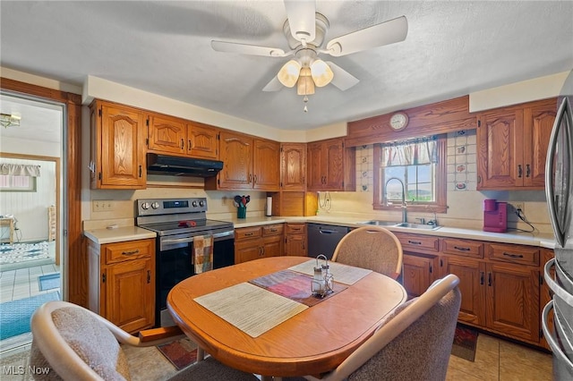 kitchen featuring stainless steel electric stove, ceiling fan, sink, black dishwasher, and light tile patterned flooring