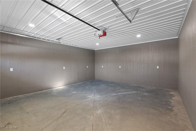 garage featuring a garage door opener