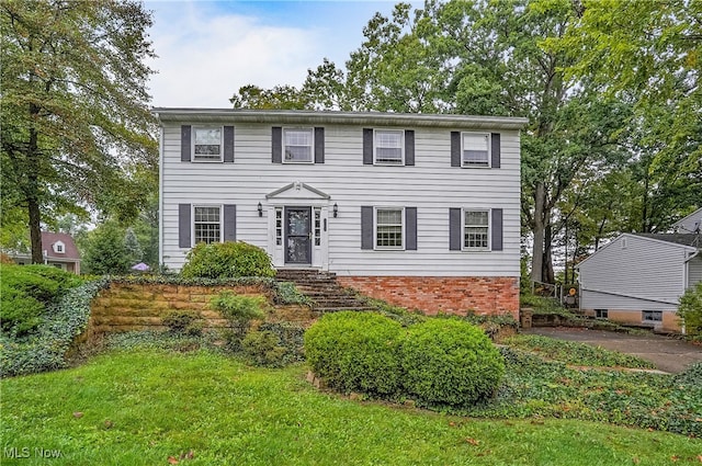 colonial house with a front lawn