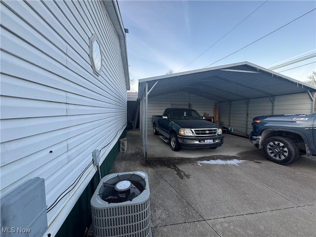 view of parking / parking lot featuring a carport