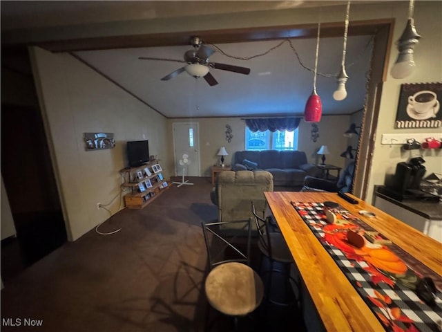 dining space featuring ceiling fan