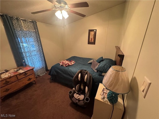 bedroom featuring carpet floors, ceiling fan, and vaulted ceiling