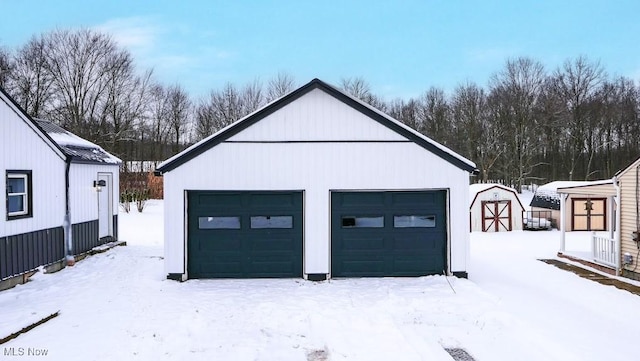 view of snow covered garage