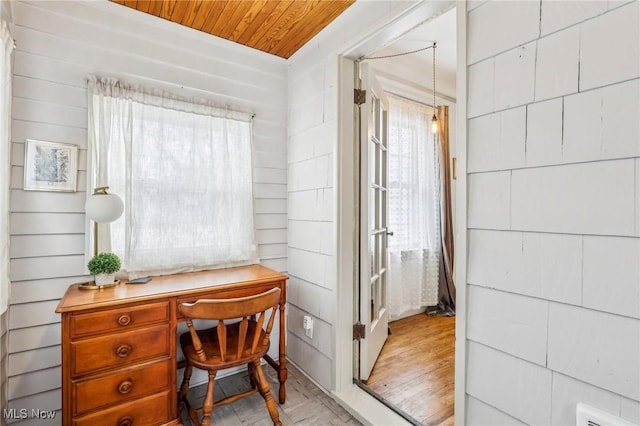 home office with wooden ceiling