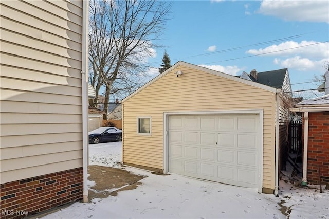 view of snow covered garage