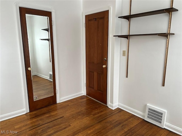 foyer featuring dark hardwood / wood-style flooring