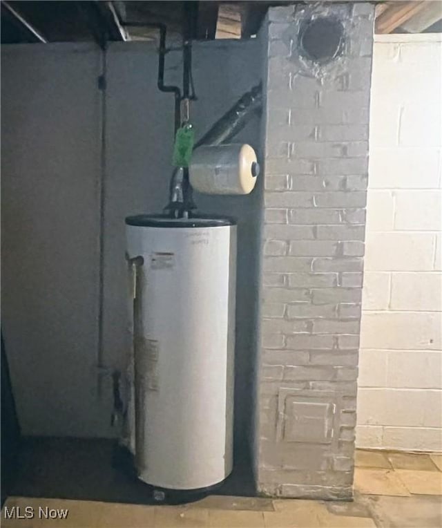 utility room with water heater