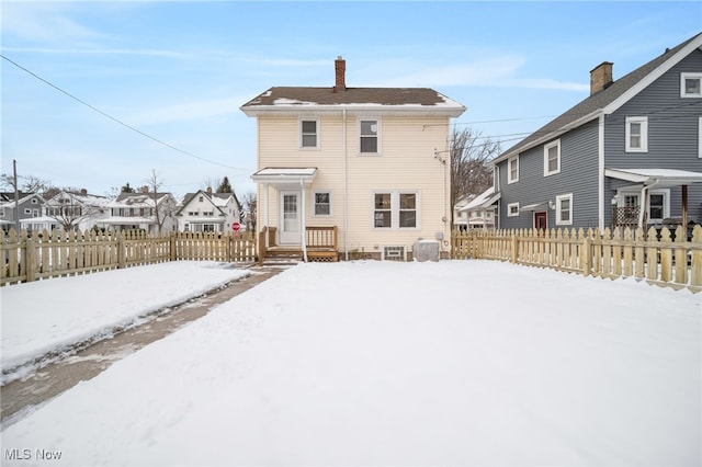 view of snow covered property