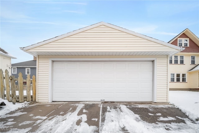 view of snow covered garage