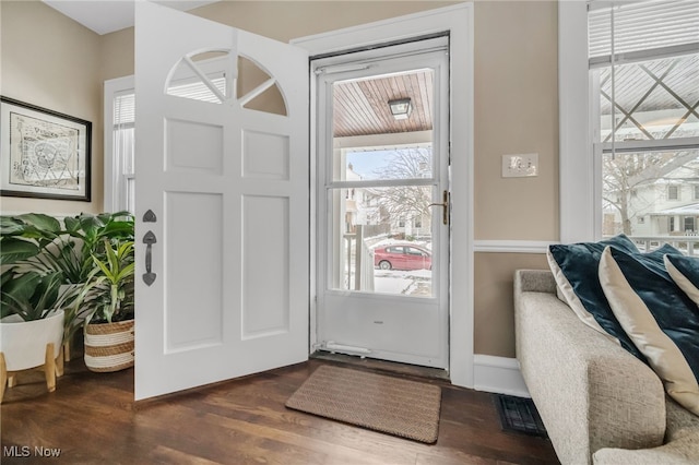 entrance foyer featuring dark hardwood / wood-style flooring