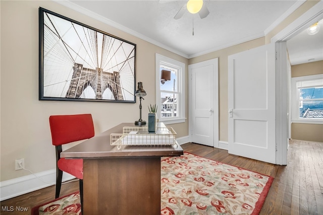 office with dark wood-type flooring, ceiling fan, and ornamental molding