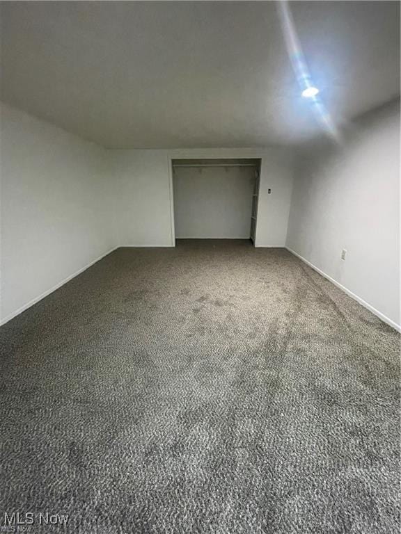 unfurnished bedroom featuring carpet