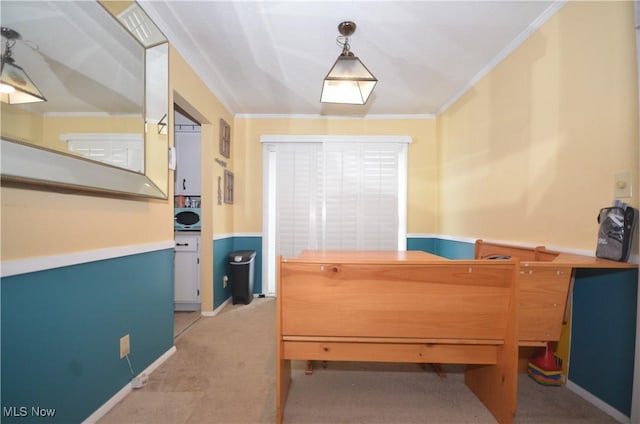 office area featuring light colored carpet, washer / clothes dryer, and crown molding