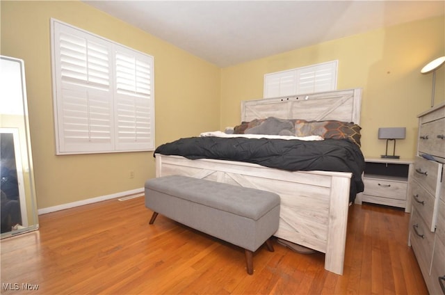 bedroom featuring hardwood / wood-style floors