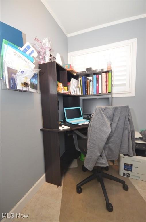 office with ornamental molding and light tile patterned floors