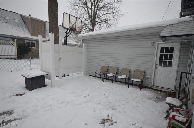 view of snow covered patio