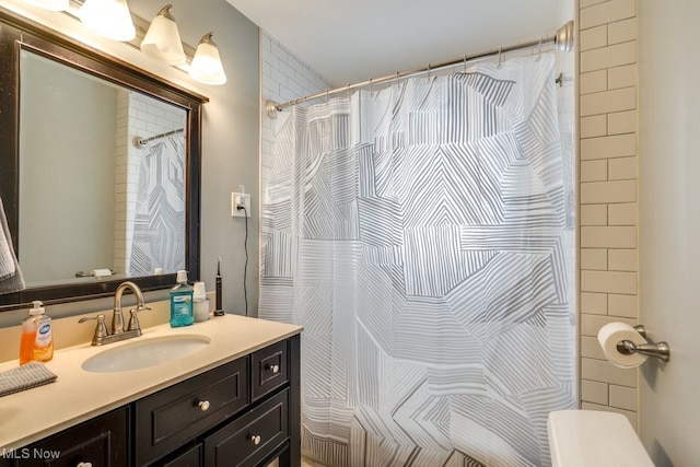 bathroom with vanity and a shower with curtain