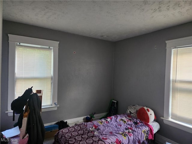 bedroom with a textured ceiling