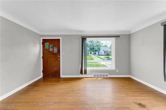 entrance foyer featuring light wood-type flooring