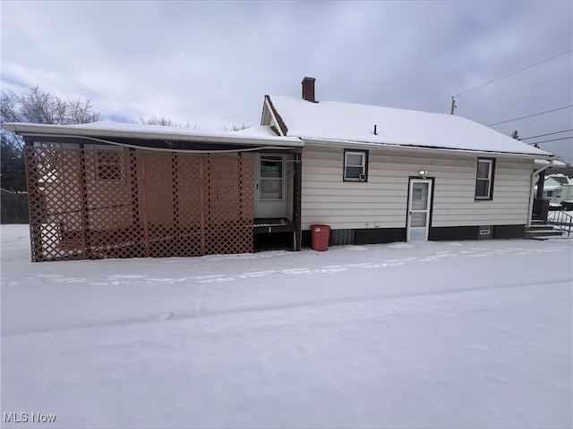 view of snow covered property