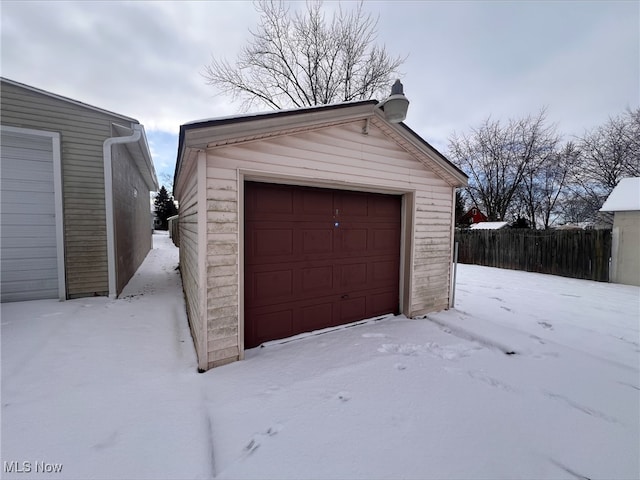 view of snow covered garage