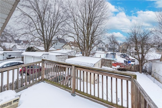 view of snow covered deck