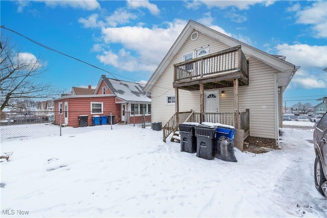 view of snow covered property