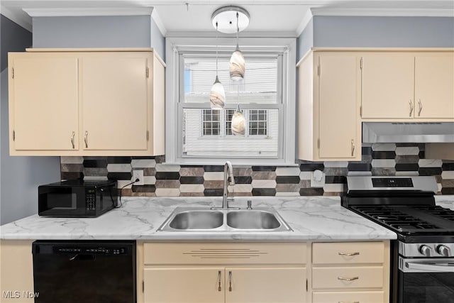 kitchen with black appliances, cream cabinets, decorative light fixtures, and sink