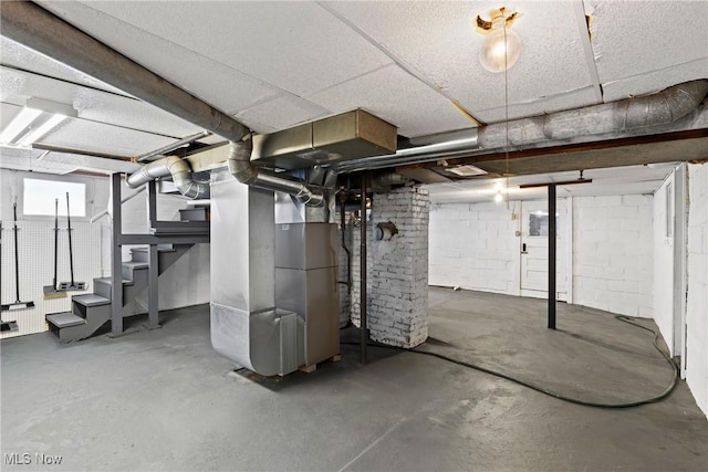 basement featuring heating unit