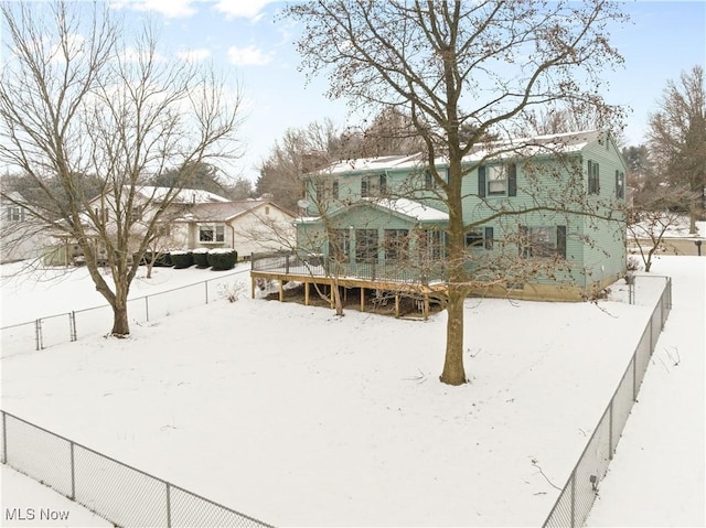 view of yard covered in snow