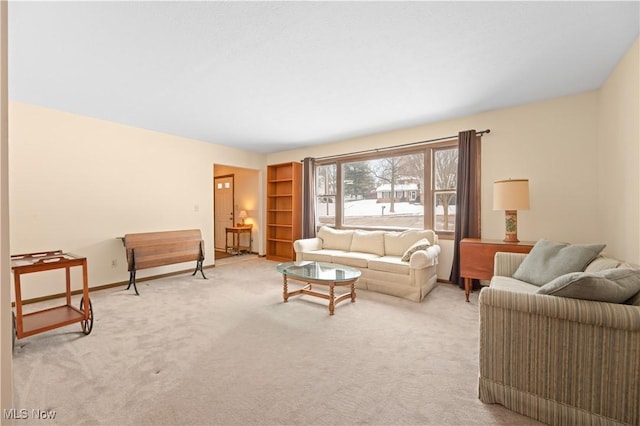 living room featuring light colored carpet