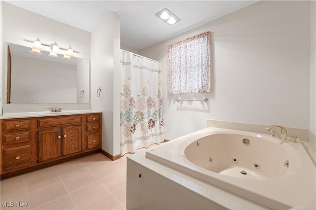 bathroom with a bathing tub, tile patterned flooring, and vanity