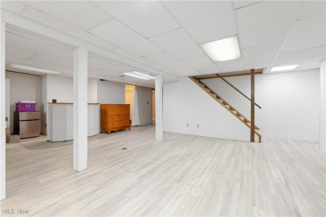 basement featuring light wood-type flooring