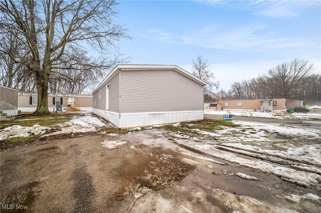 view of snow covered property