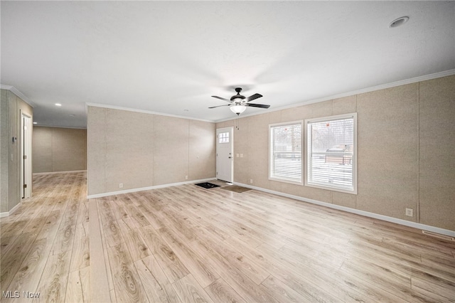 unfurnished living room with ornamental molding, ceiling fan, and light hardwood / wood-style floors