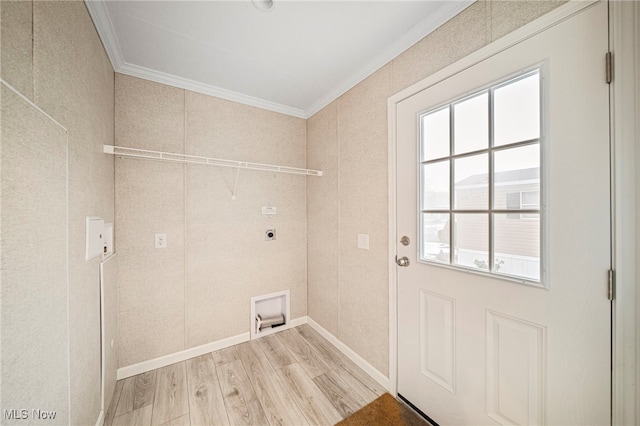 clothes washing area featuring hardwood / wood-style flooring, ornamental molding, electric dryer hookup, and hookup for a washing machine