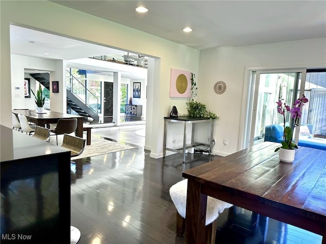 dining room with dark hardwood / wood-style floors