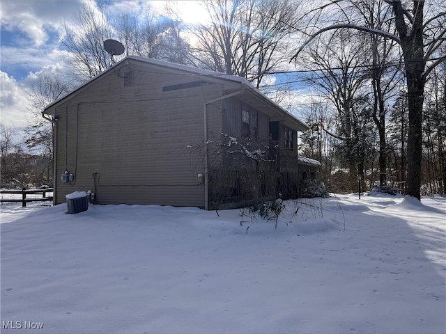 view of snow covered property