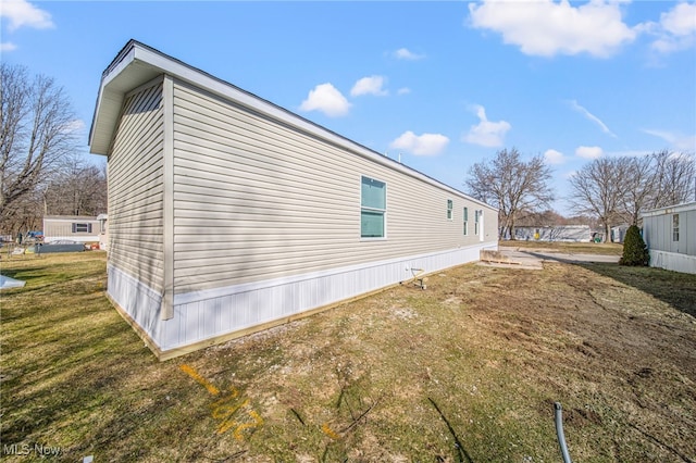 3583 Austin Rd Unit 134, Geneva, OH 44041 - view of side of property with a lawn