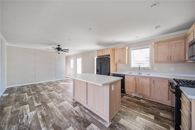 3583 Austin Rd Unit 134, Geneva, OH 44041 - kitchen with crown molding, a kitchen island, light brown cabinets, a sink, and black appliances