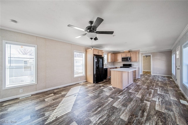 3583 Austin Rd Unit 134, Geneva, OH 44041 - kitchen featuring dark wood-style flooring, crown molding, light brown cabinetry, light countertops, and black appliances