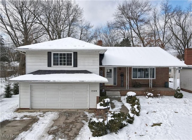 view of front of home with a garage