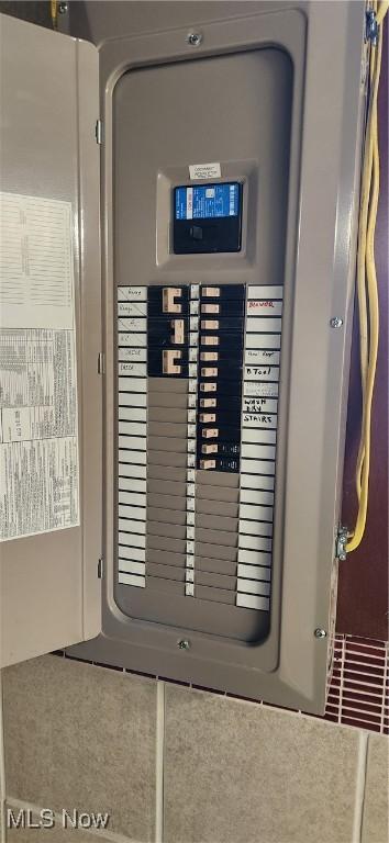 utility room featuring electric panel