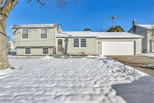 split level home featuring a garage