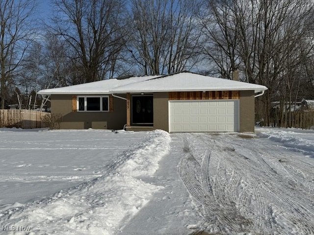 single story home with a garage