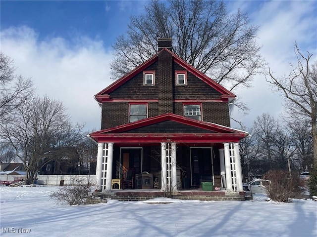 view of front of property featuring covered porch