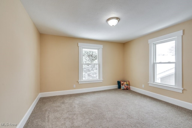 empty room with carpet floors