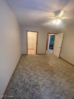 unfurnished bedroom featuring carpet flooring and ceiling fan